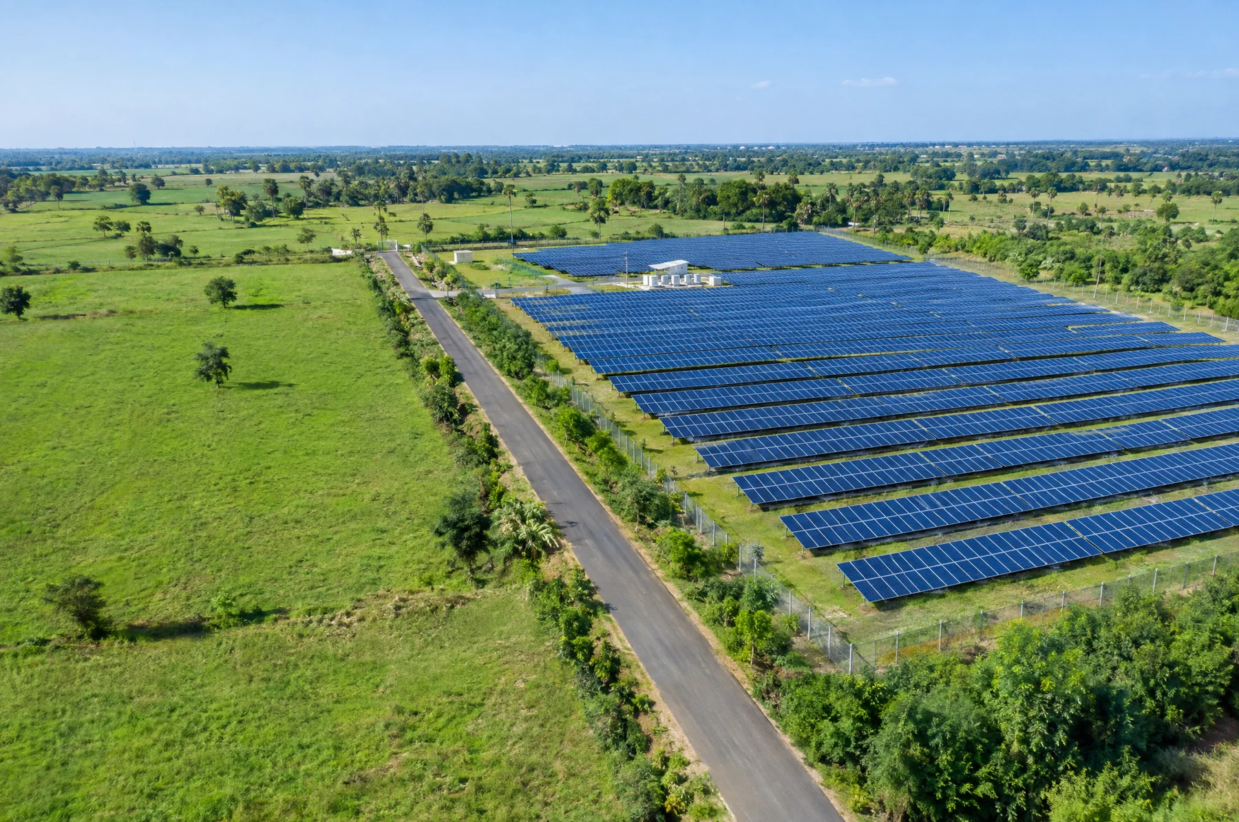 Illustration of a daylight solar development alongside open land and access roads
